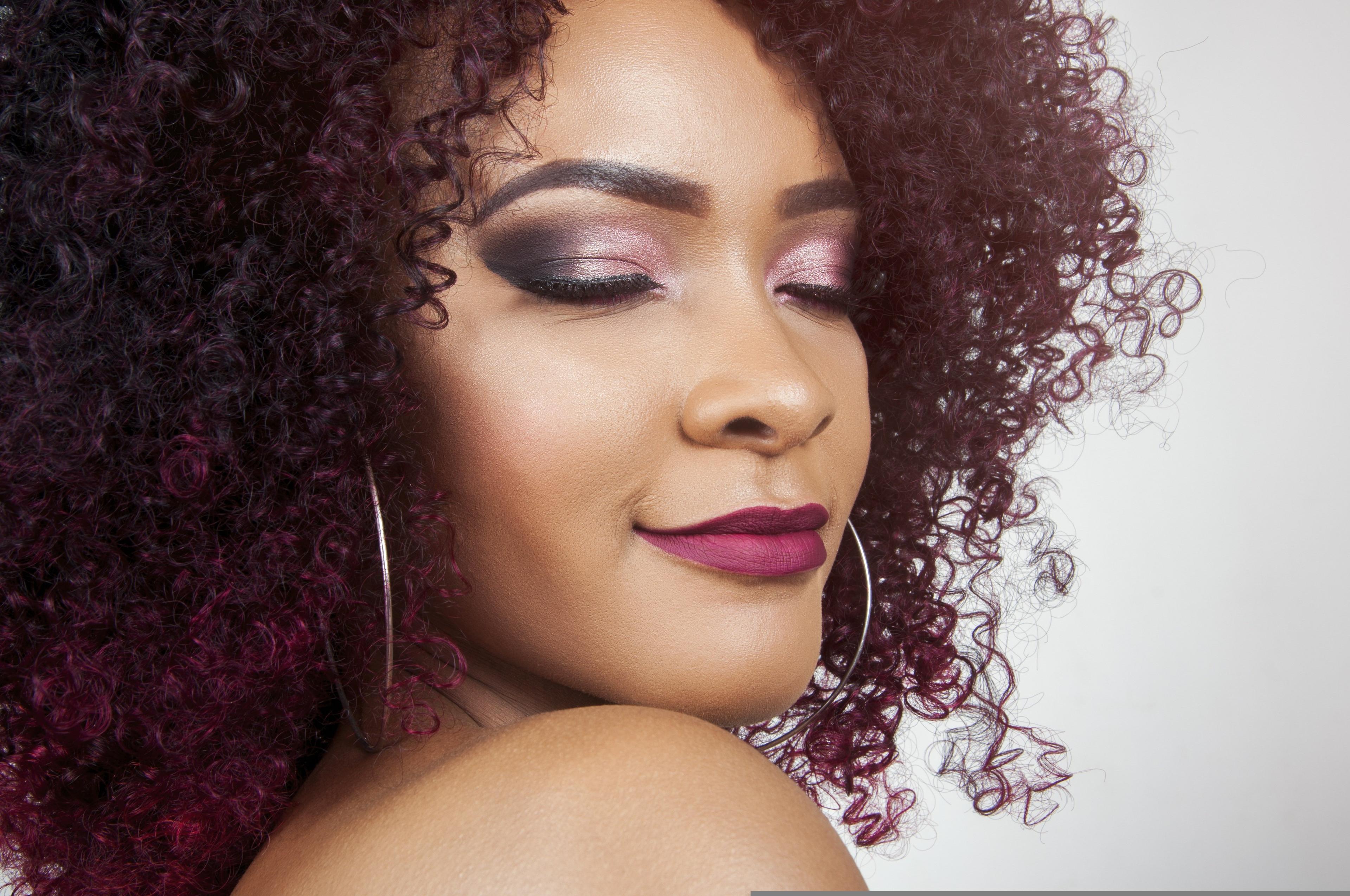 A Hair Passport member wearing her natural hair